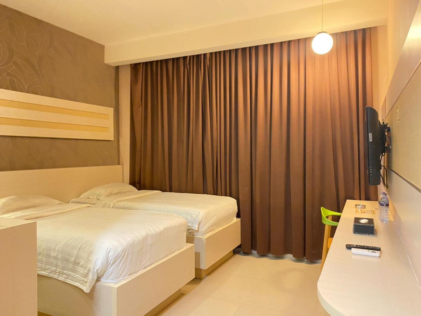 Classie Hotel Palembang Esterno foto